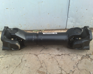 Вал карданный Камаз 43114   среднего моста (4 отверстия, торцевые шлицы) Длина L=699мм